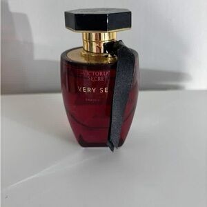 Victoria's Secret Deep Red Perfume with Black and Gold Accents